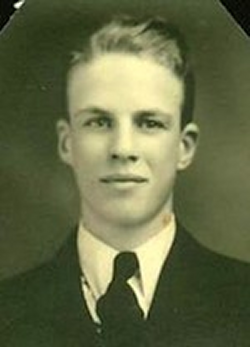 Allan Ewoldt smiling wearing a suit