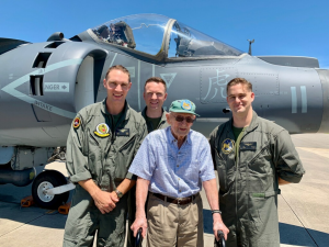 photo of Curt Thomson in front of a plane