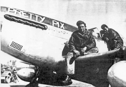 photo of Don Marner in uniform sitting on an airplane wing
