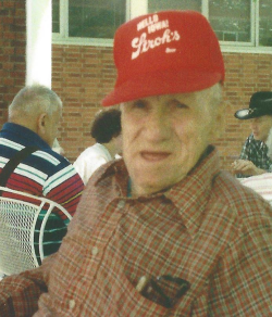 Edward Barnes sitting at a picnic