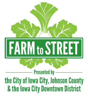 Logo for the Farm to Street Dinner featuring a light green leafy background with a leek vegetable in the center and the words Farm to Street written on a dark green background resembling a street sign below this image are words presented by the City of Iowa City, Johnson County and the Iowa City Downtown District