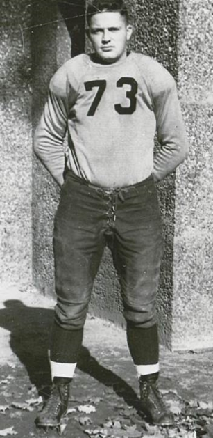 Jack Leonard standing at attention wearing his European Conference football uniform