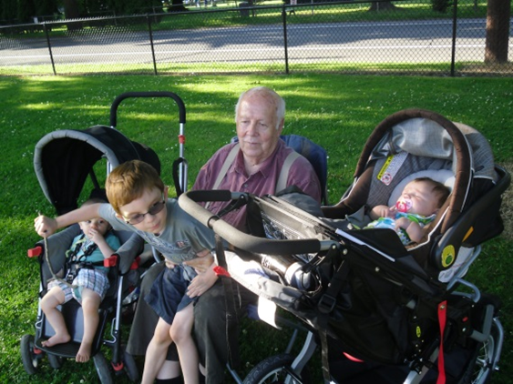 James Arndt sitting with his grandchildren