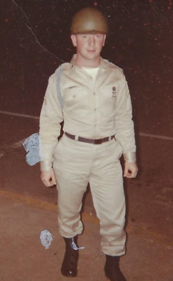 James Weno in his Army uniform and helmet