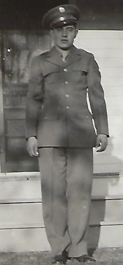 John Weno standing in front of a house wearing his Army uniform John Weno standing in front of a house wearing his Army uniform