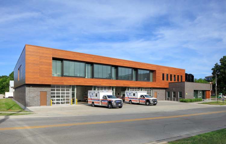 Johnson County AME Building during daylight hours with two ambulances out front