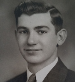 Joseph Skubal in a professional photo wearing a suit