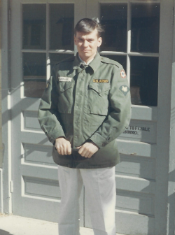 Leonard Burkart standing in outside in front of a building