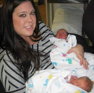 Mandy O;briend holding her newborn twins, Cooper and Chloe