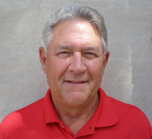 Pete Vanderhoef years later in an upclose photo wearing a red polo