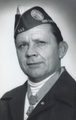 Ralph Neppel's updated Army photo with an award around his neck