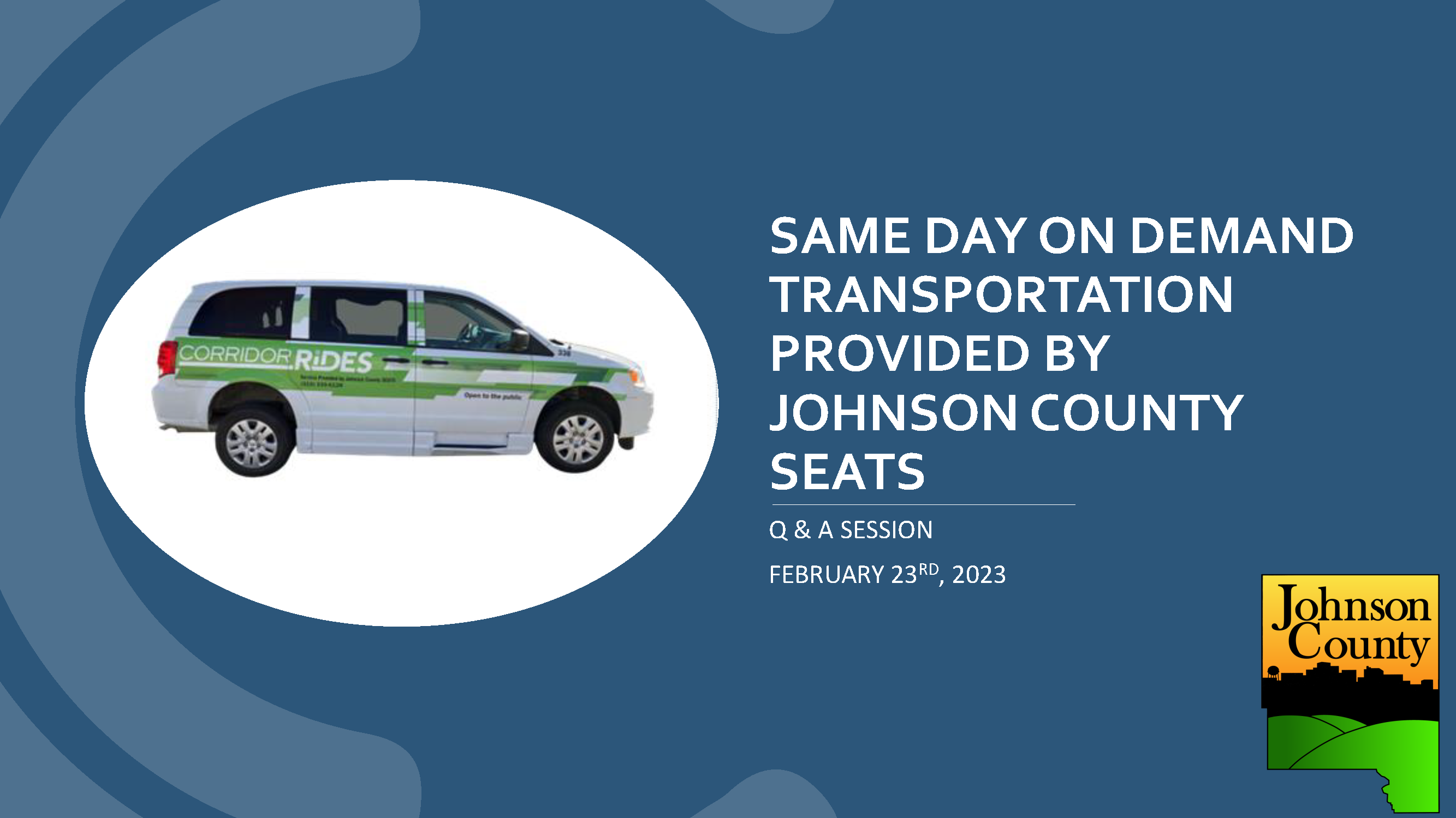 This image contains a photo from the Same Day On Demand Transportation Service Training recording.  The text on the image reads “Same Day on Demand Transportation Provided by Johnson County SEATS. Q & A Session, February 23, 2023”