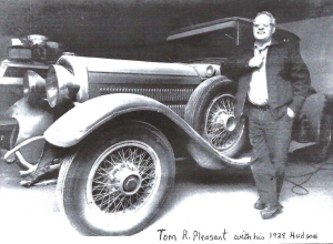 Tom Pleasant photo standing in front of old car