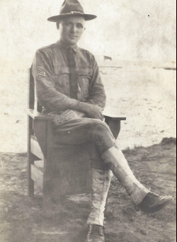 William White sitting in a chair in his uniform