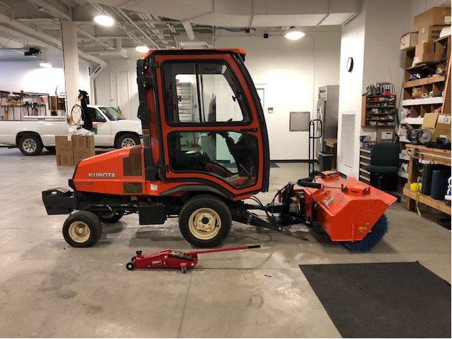 Photo of a rotating brush used to clear areas near county buildings