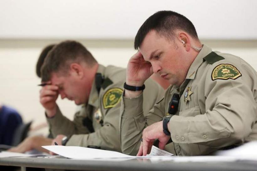 Two officers studying